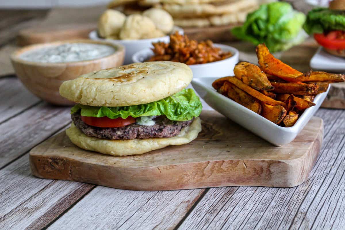Sweet potato fries and plant based burger on a platter
