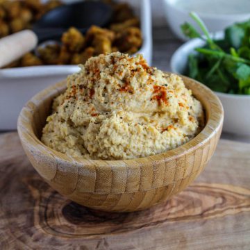 Creamy Hummus Without Garlic in a bowl.