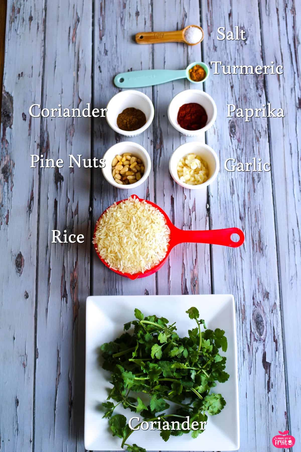 Ingredients for Easy Mediterranean Yellow Rice, salt, turmeric, paprika, garlic, coriander, rice, pine nuts & coriander powder.