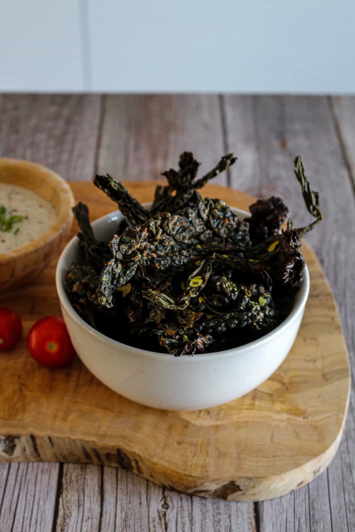 Nacho Cheese Baked Kale Chips with vegan ranch dip.