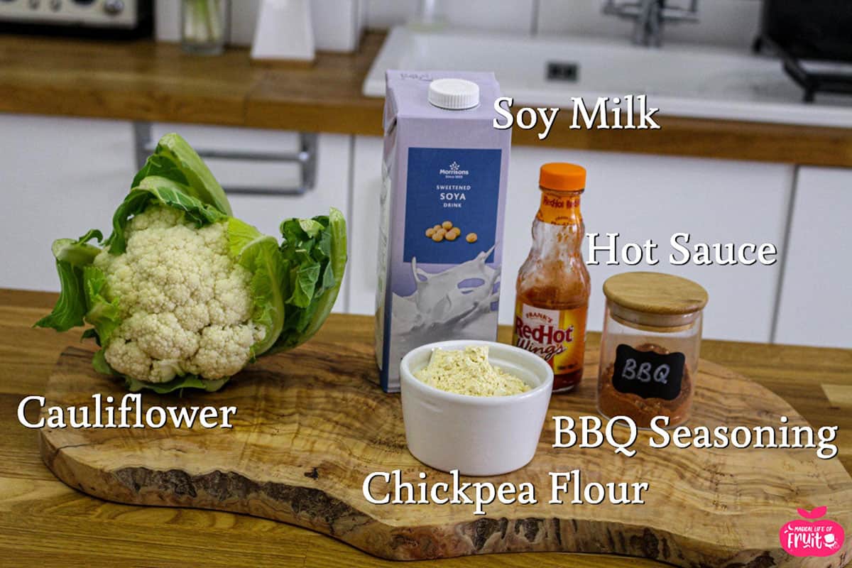 Ingredients for Spicy Vegan Cauliflower Buffalo Wings, cauliflower, soy mlk, hot sauce, BBQ seasoning, chickpea flour.