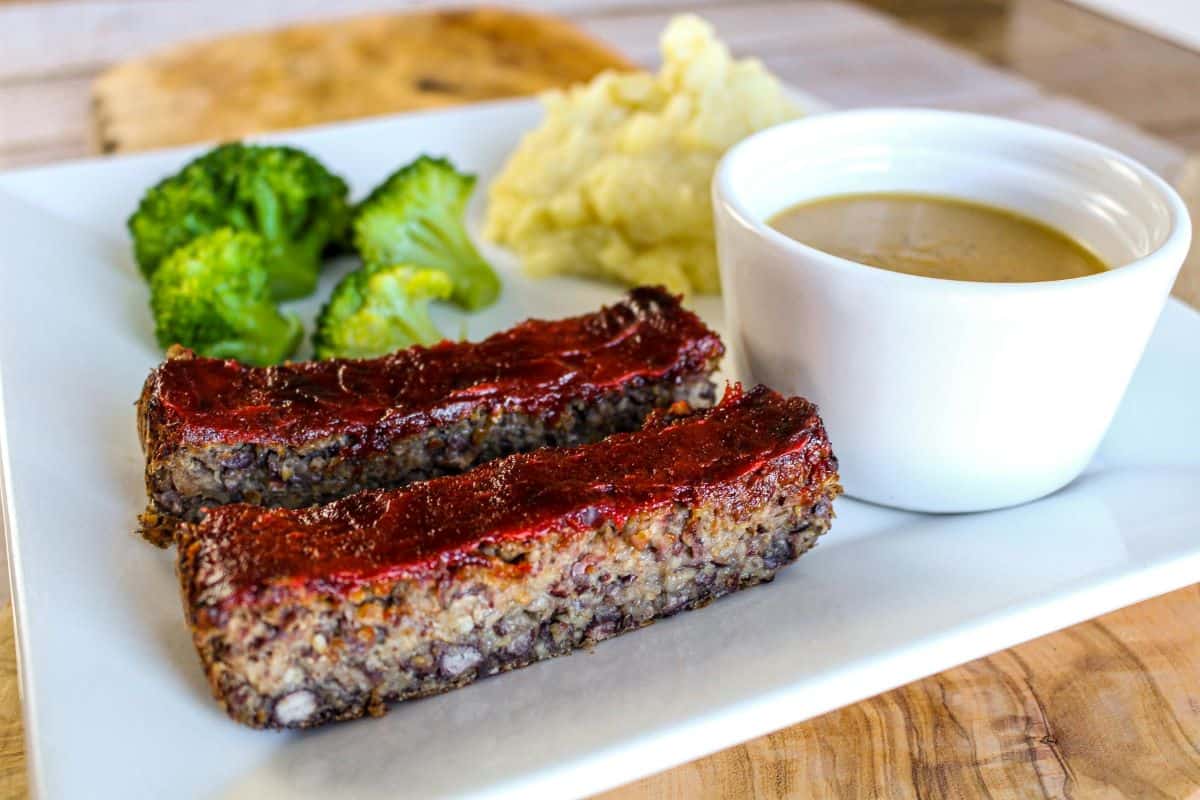 The Ultimate Vegan Meatloaf With Gravy on a plate.