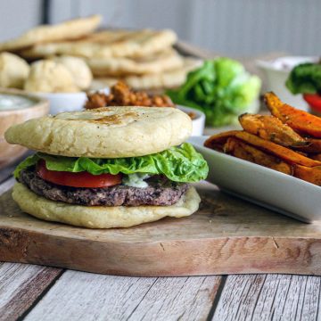 Vegan Burger And Fries on a board.